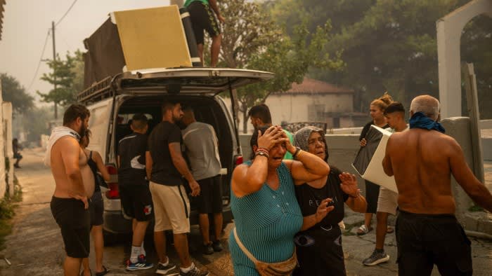 Chaos in Athens: Residents Flee as Wildfires Rage Near the Capital