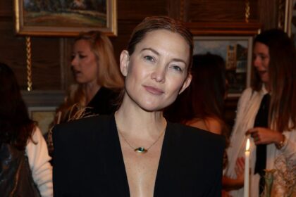 Kate Hudson Stuns in a Plunging LBD with an Unexpected Twist!